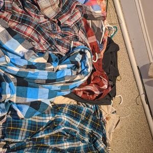 Men's button up shirts.  Most new with tags